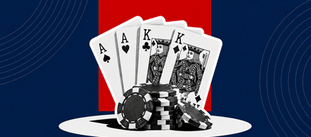 4 playing cards behind a stack of chips